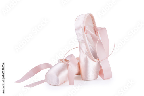 Pink ballet shoes isolated on a white background