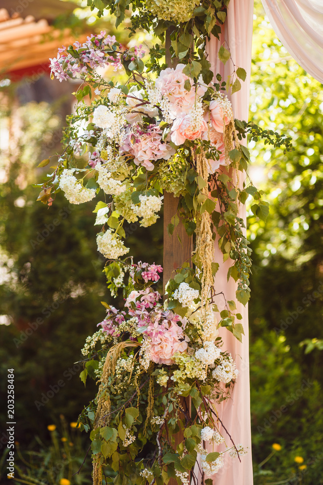 Wedding ceremony. Decoration from fresh flowers