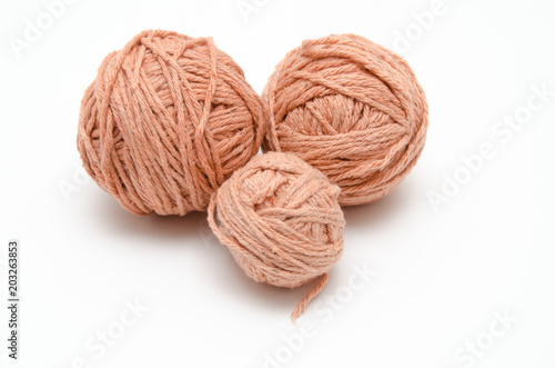 Colorful balls of yarn isolated on white