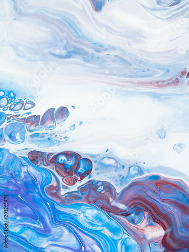 Blue, violet and pink marble abstract hand painted background
