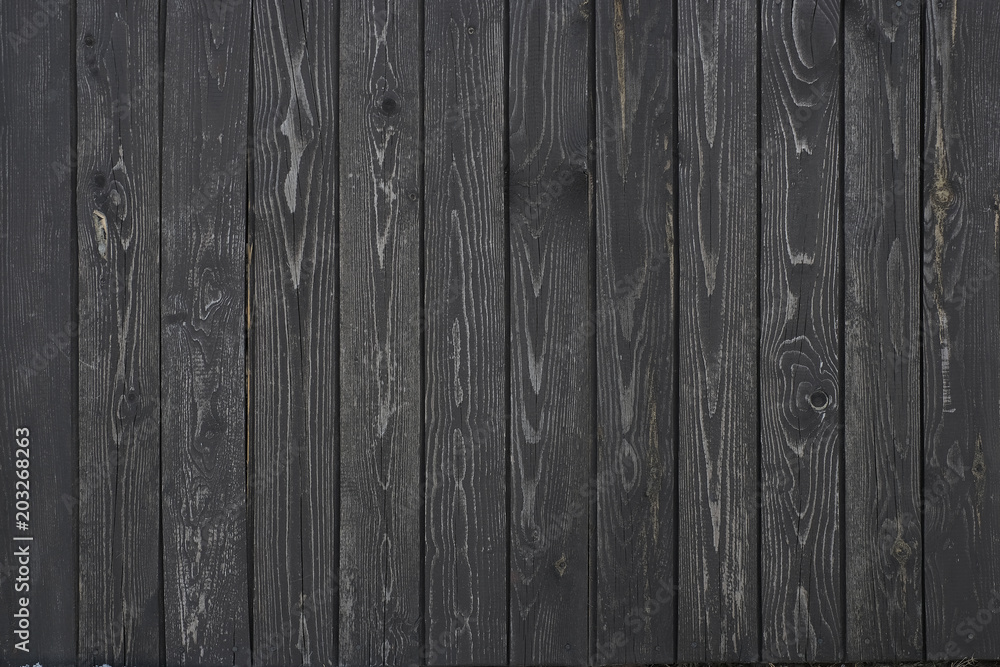 Naklejka premium wooden texture of burnt black boards
