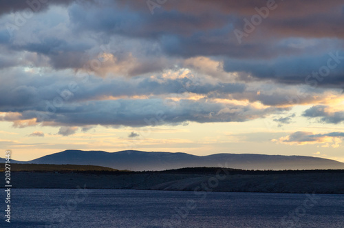 Dark clouds at sunset over a landscape on the coast of Croatia