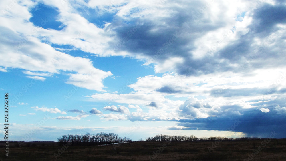 Obraz premium Blue sky and white clouds.The natural background.