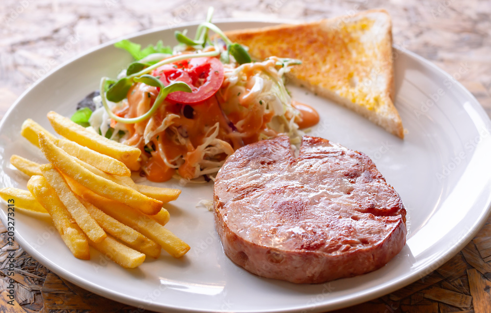 Ham steak and vegetable salad