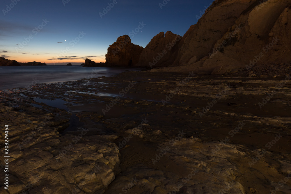 PNight landscape in the Portio Beach. Liencres. Cantabria. Spain.