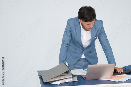 Businessman feeling failed, sad, distraught, frustrated