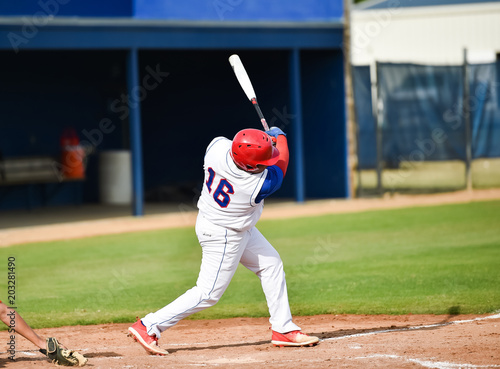 Wall Mural Baseball player swinging at the ball