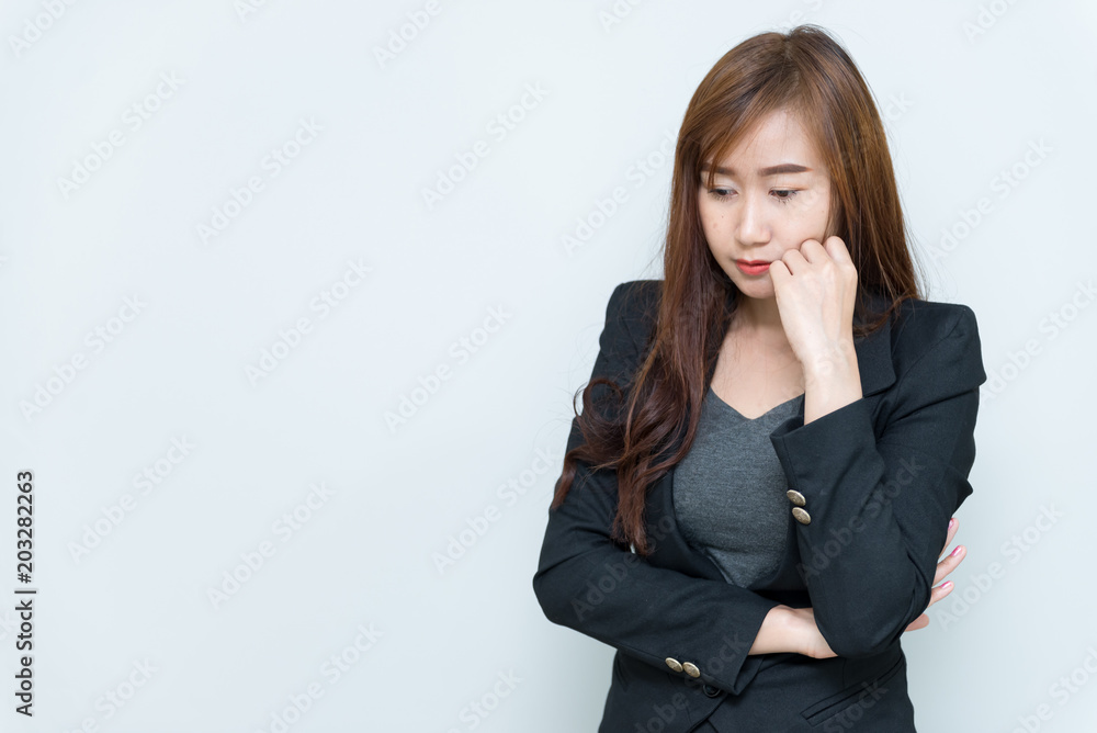 Beautiful asian business woman think something on white background,Thailand people,Stress from work,Sad woman concept Beautiful asian business woman think something on white background,Thailand people,Stress from work,Sad woman concept