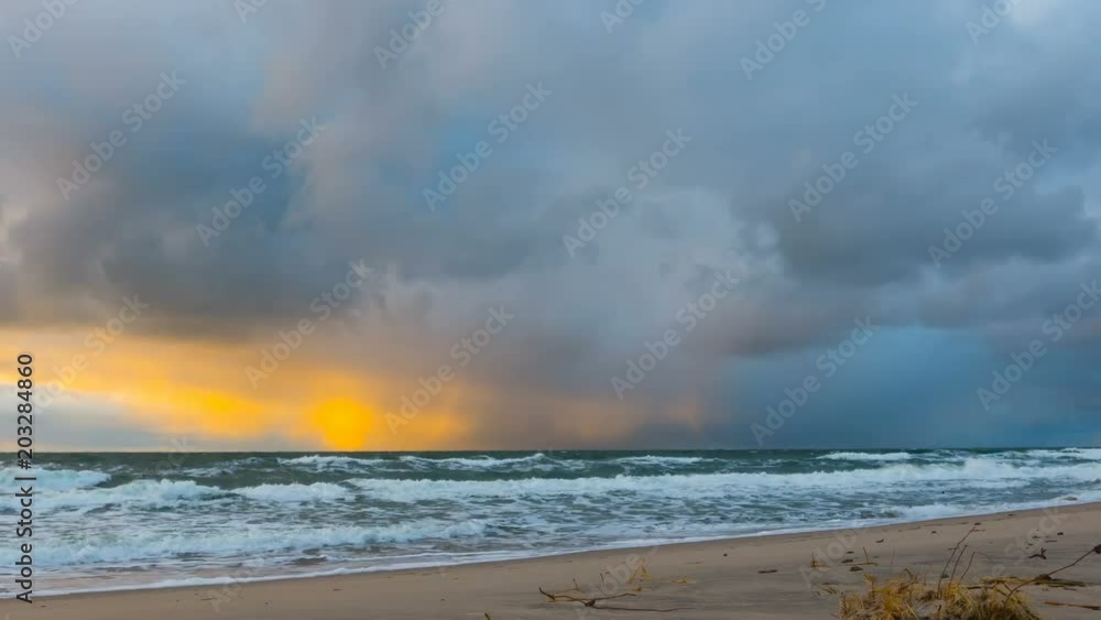 Dark and dramatic storm cloud area background. Time Lapse. Epic storm tropical clouds at sunset. Coast of the Pacific Ocean. Palm beach. Timelapse 4K UHD. Dark and dramatic storm cloud area background. Time Lapse. Epic storm tropical clouds at sunset. Coast of the Pacific Ocean. Palm beach. Timelapse 4K UHD.