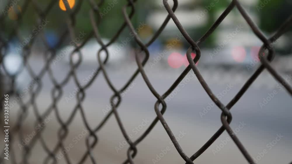 chain-link fence roadside the street chain-link fence roadside the street
