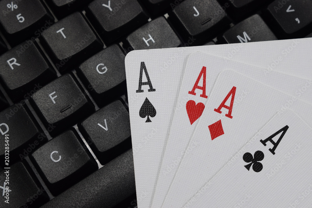 Obraz premium virtual casinos, real money. keyboard and playing cards