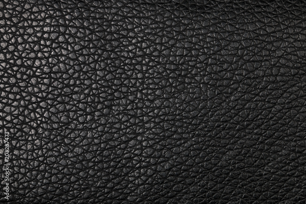 Luxury black leather background. Macro photography. Luxury black leather background. Macro photography.