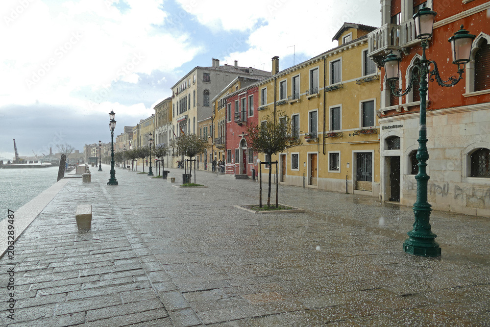 Venice street during heavy shower with hail