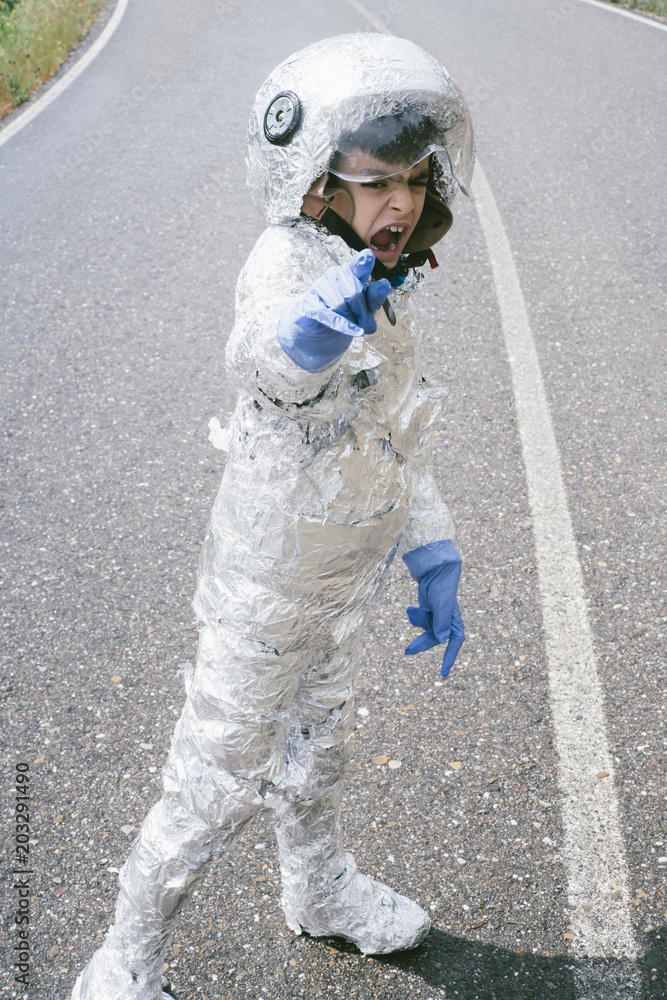 Fototapeta premium Little boy happy playing to become an astronaut