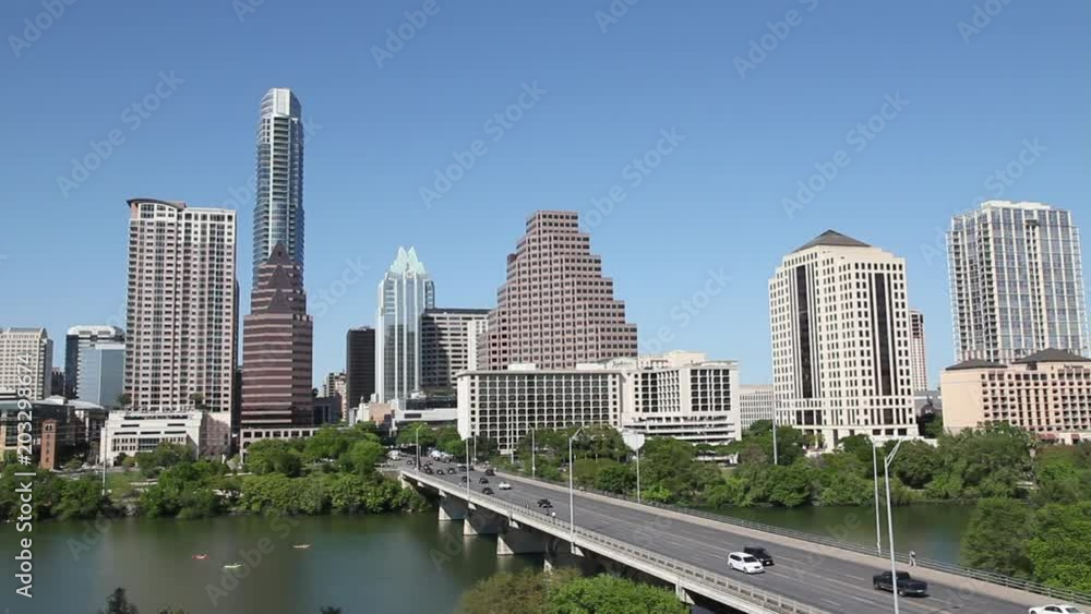 Kayaks in Downtown River with Congress Bridge in Austin, Texas (Timelapse) Kayaks in Downtown River with Congress Bridge in Austin, Texas (Timelapse)