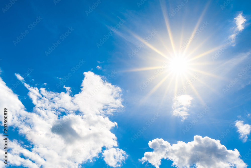Sunny background, blue sky with white clouds and sun Sunny background, blue sky with white clouds and sun