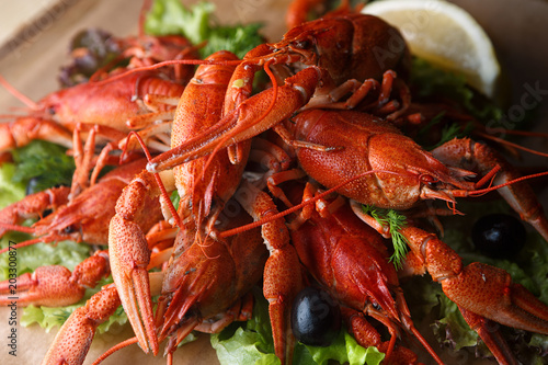 Boiled crayfish on a wooden board