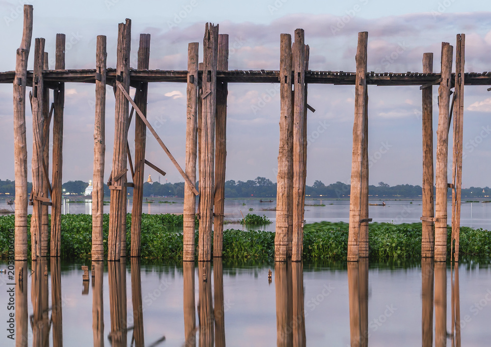 U Bein Bridge, wood structure bridge near Mandalay, peaceful and beautiful site, Myanmar U Bein Bridge, wood structure bridge near Mandalay, peaceful and beautiful site, Myanmar