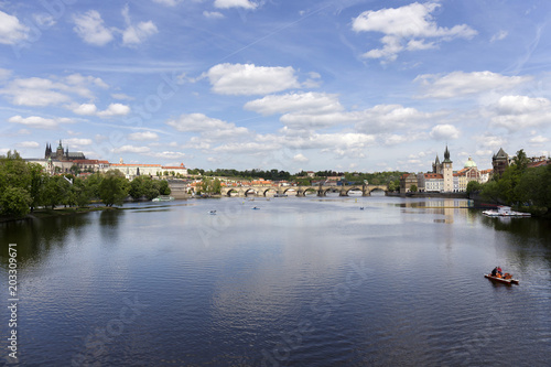 Spring green Prague Lesser Town with gothic Castle above River Vltava in the sunny Day, Czech Republic © Kajano
