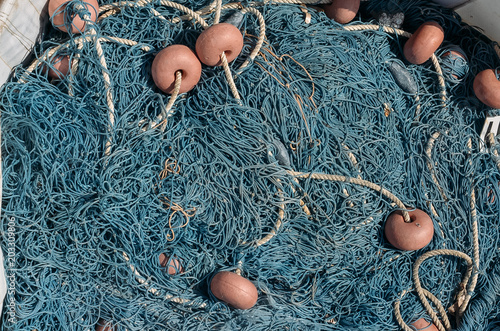 Blue fishing net, fishing equipment. Texture, background. Copyplace, place for text photo