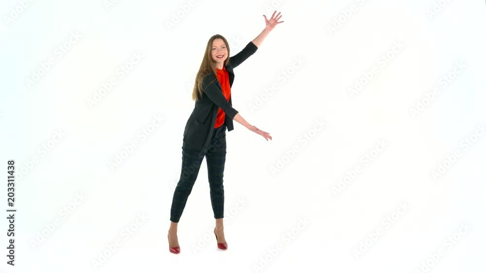 Womanl in the studio on a white background shows gestures. Copyspace for text Womanl in the studio on a white background shows gestures. Copyspace for text