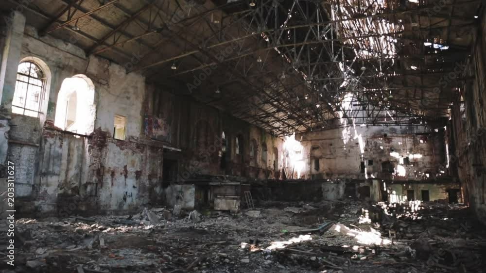 Ruined and abandoned dark creepy factory house building inside, industrial warehouse hall waiting for demolition, toned Ruined and abandoned dark creepy factory house building inside, industrial warehouse hall waiting for demolition, toned