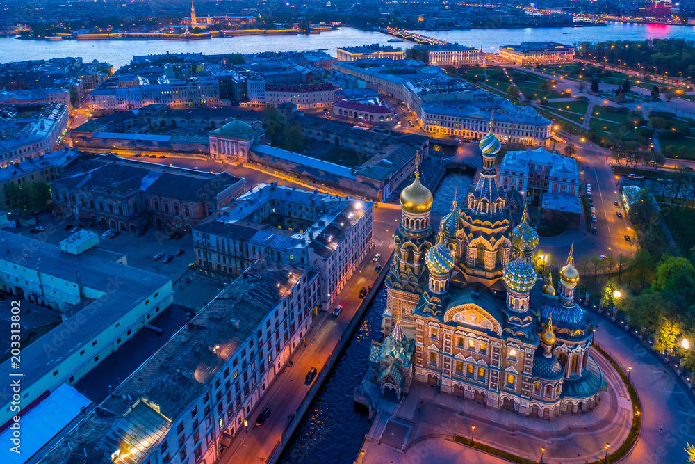 Petersburg from the heights. The Church of the Savior on Blood. Evening city of St. Petersburg.
Museums of Russia. Architecture of Russia. Domes of the Church of the Savior on Blood in St. Petersburg