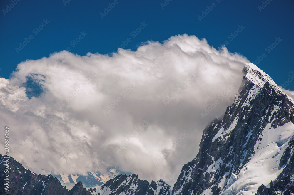 Close-up of snowy peaks and mountains, viewed from the Aiguille du Midi, near Chamonix. A famous ski resort located in Haute-Savoie Province, at the foot of Mont Blanc in the French Alps.