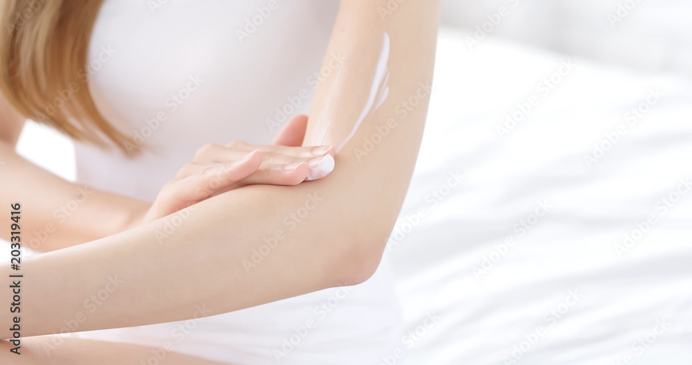 Naklejka premium woman use cream