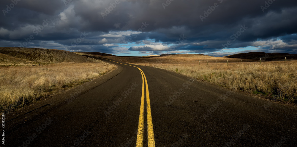 Road Under Cloudy Sky