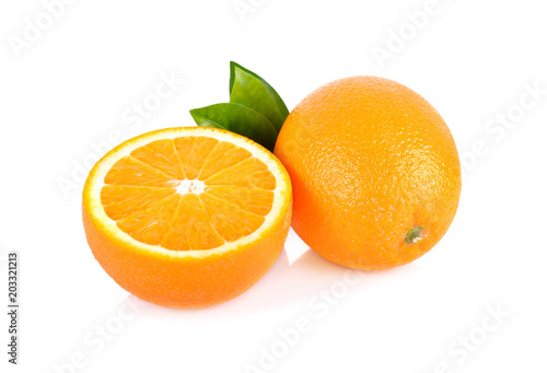 whole and half cut fresh Navel orange with leaf on white background