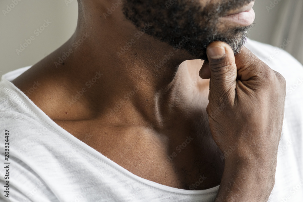 Naklejka premium Black man thinking and contemplating concept