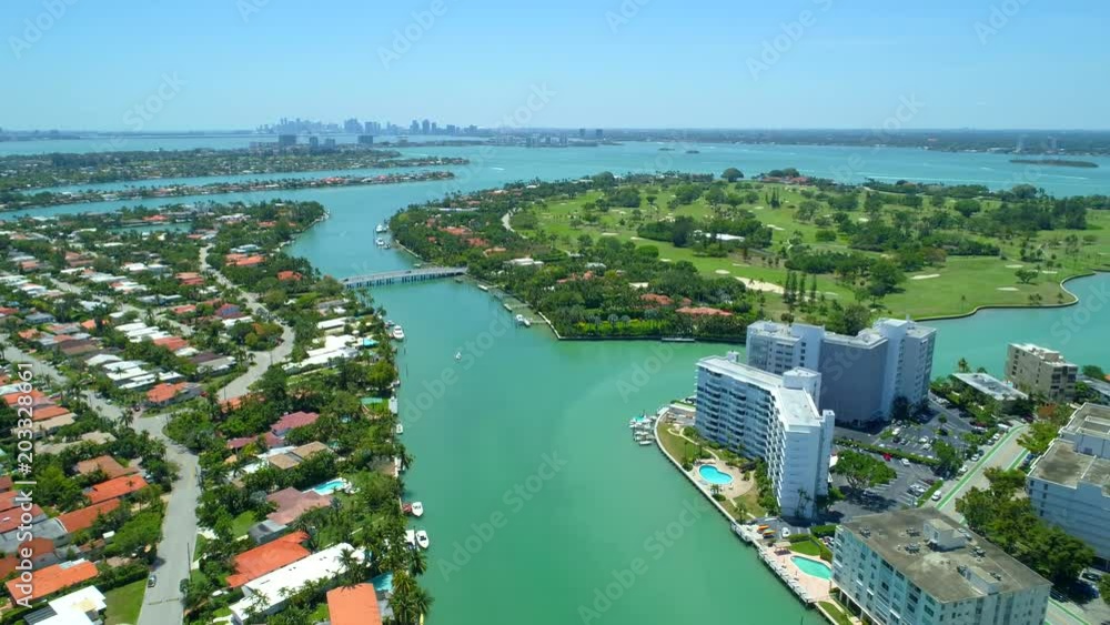 Aerial pull away out establishing shot Miami Beach residential islands Bay Harbor Aerial pull away out establishing shot Miami Beach residential islands Bay Harbor