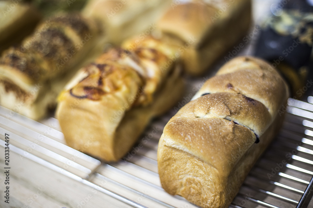 Fresh bread on table close-up. Fresh bread on the kitchen table The healthy eating and traditional bakery