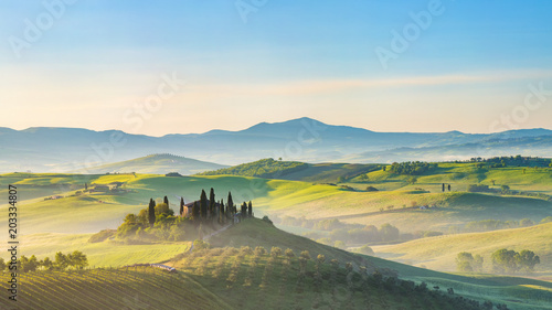Fototapeta Naklejka Na Ścianę i Meble -  Beautiful foggy landscape in Tuscany, Italy
