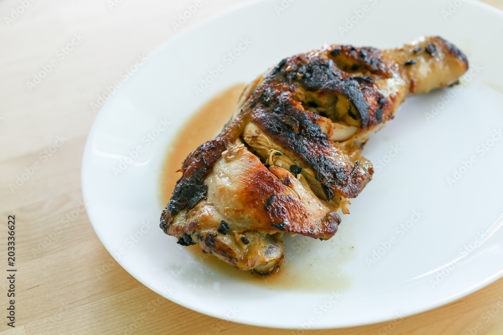 Grilled chicken burns on dish. Grilled chicken burns on dish.