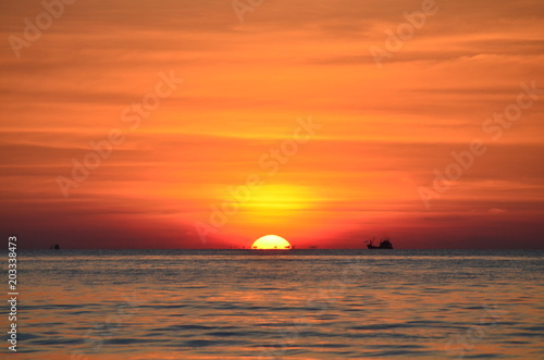 sunset and beach © kwanchaift
