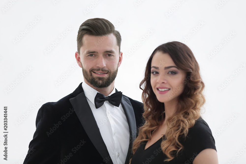 Portrait of a handsome man looking at the camera with a woman Portrait of a handsome man looking at the camera with a woman