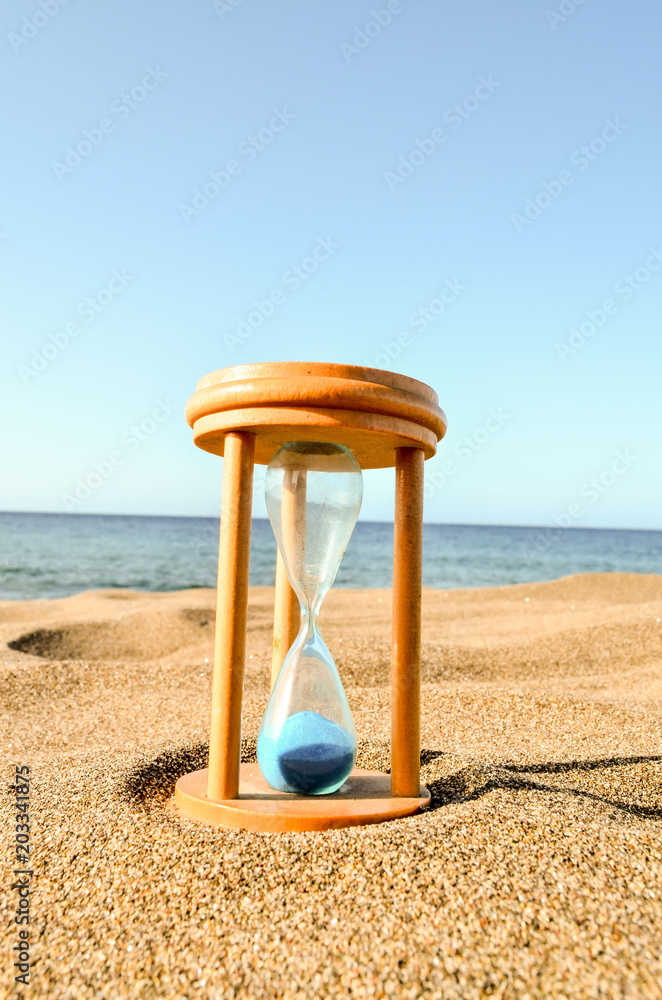 Hourglass Clock on the Sand Beachsand hourglass time hour