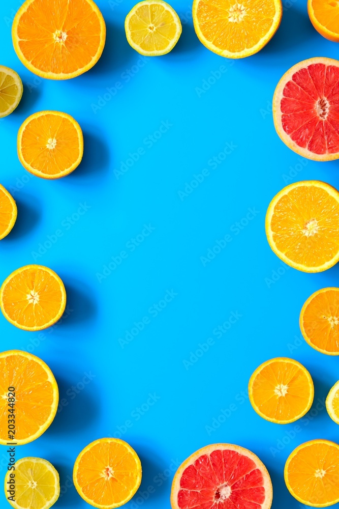 Citrus fruits top view border background. Citrus fruits top view border background.