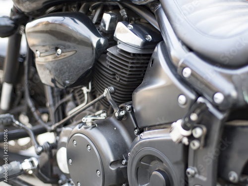 Horizontal image of the details of a motorcycle. close up © Stavros