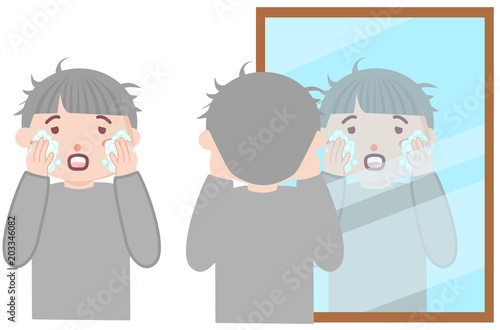 洗顔をする男性