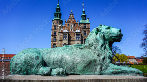 Lion statue in front of Rosenborg Castle, Copenhagen, Denmark photo