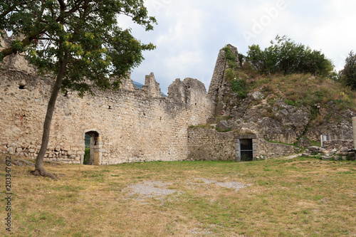 The ruins of Penede castle in Nago-Torbole, Italy photo