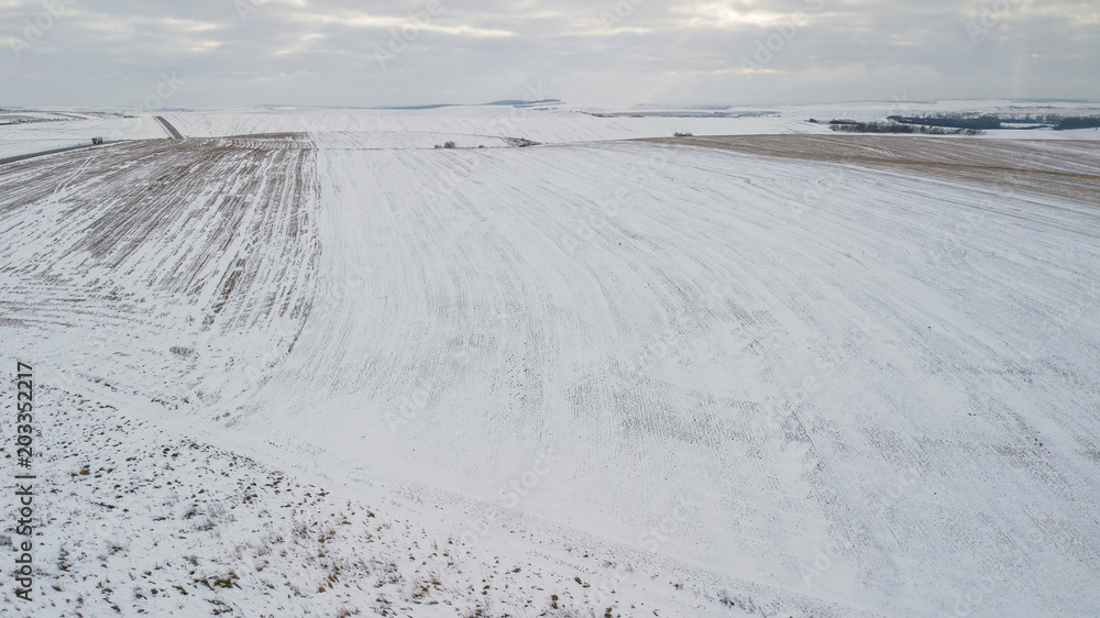 View from the air on the winter field View from the air on the winter field