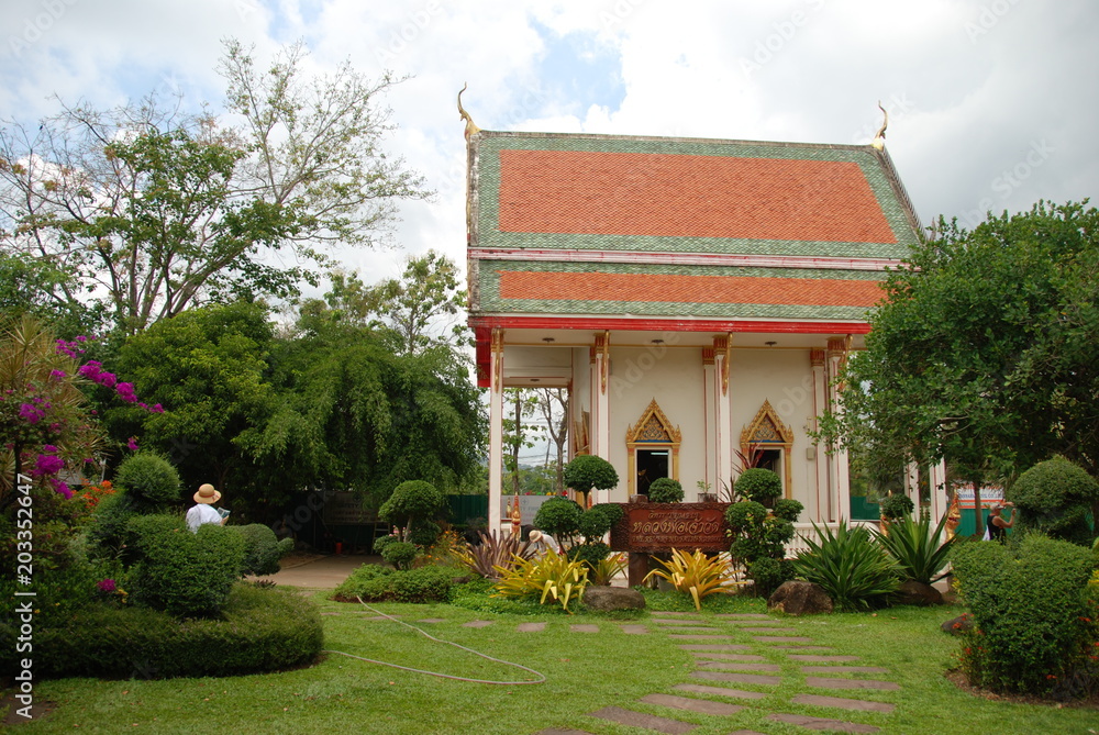 A small thai buddhist temple  in a garden of Wat Chalong temple area, Phuket, Thailand