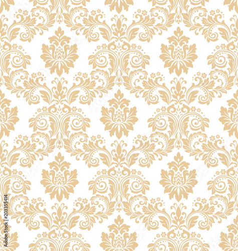 Wallpaper in the style of Baroque. A seamless vector background. White and gold floral ornament. Graphic pattern for fabric, wallpaper, packaging. Ornate Damask flower ornament