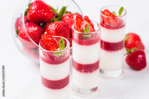 Strawberry Panna Cotta on a white background  close 