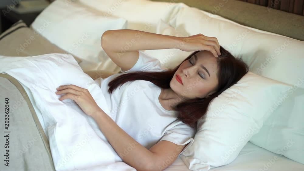 slow motion of woman sleepless on bed slow motion of woman sleepless on bed
