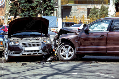 the collision of two cars.